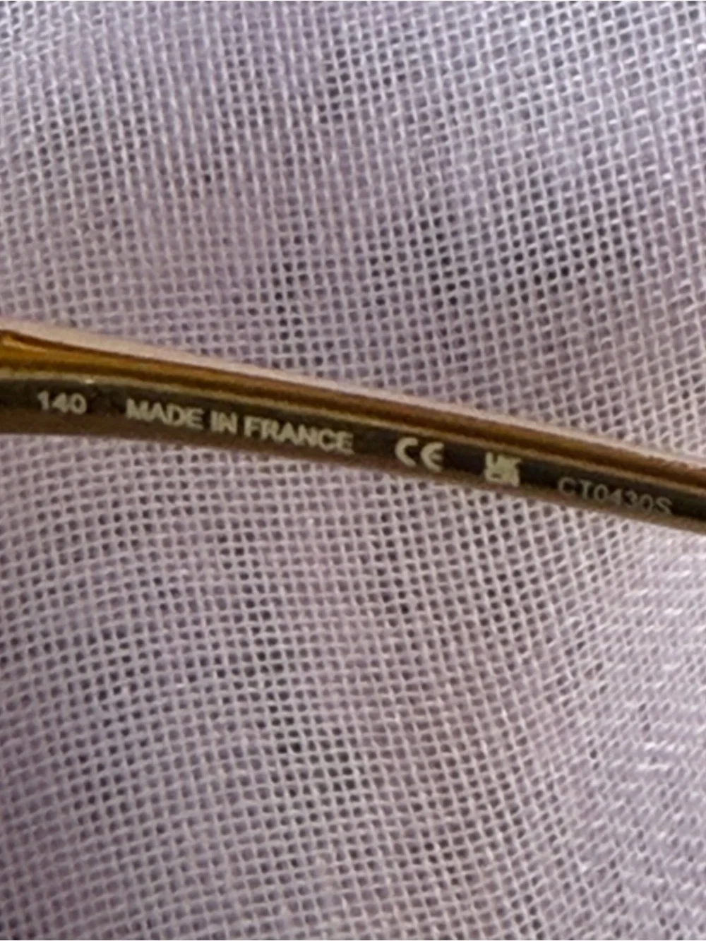 Cartier Gold Rimless Sunglasses with Dark Lenses